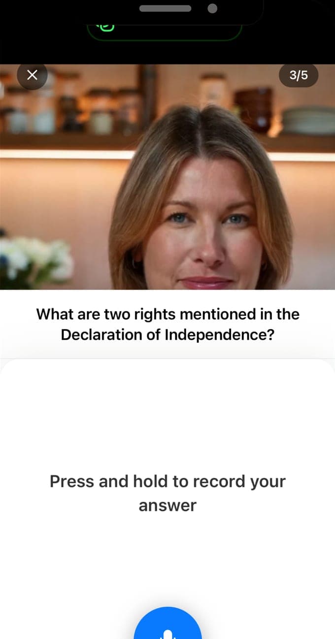 The voice interview in USCIS Interview Practice, question 3 of 5: the interviewer on video asks what two rights are mentioned in the Declaration of Independence, above a press-and-hold microphone button for the spoken answer